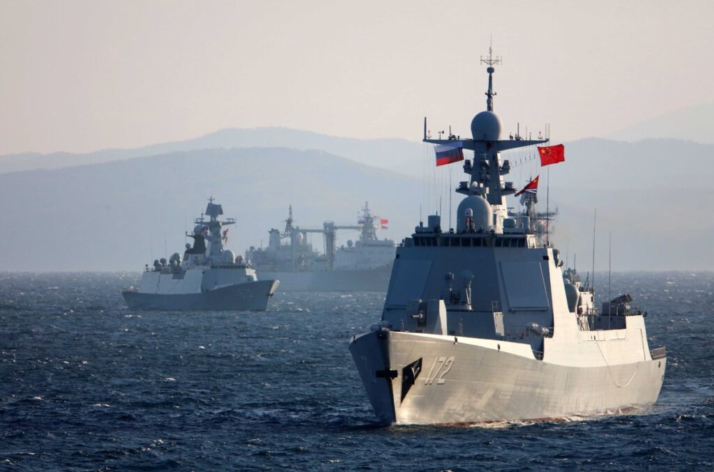 Russian and Chinese warships participating in joint naval exercises in the Pacific.